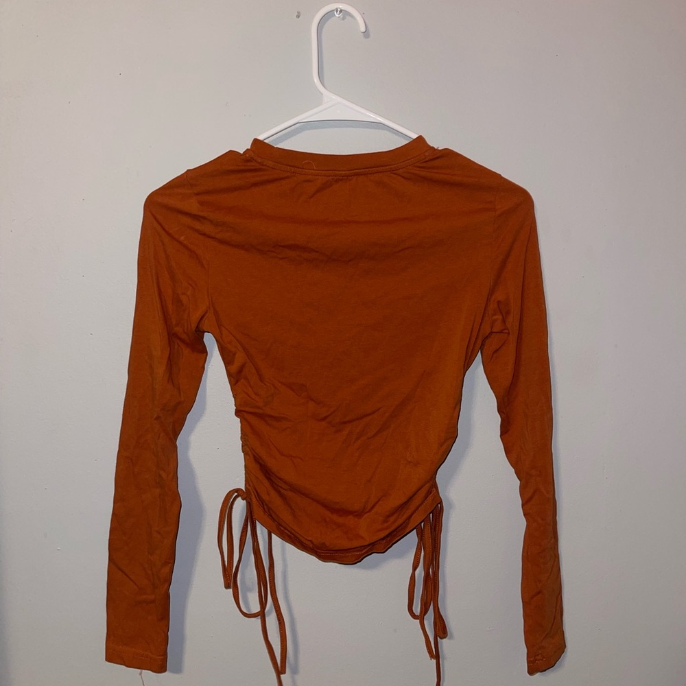 Orange draw string side long sleeve